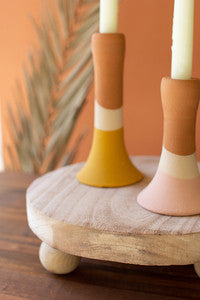 set of 2 round wooden risers with ball feet